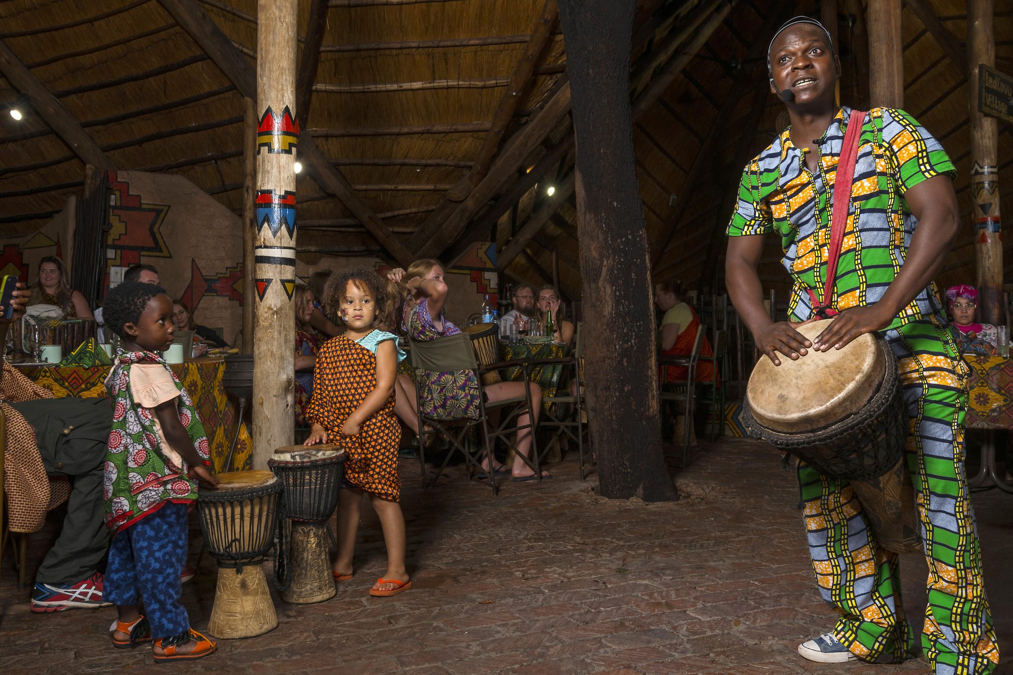 The-Boma-Dinner-Drum-Show-children-drumming-2048x1365